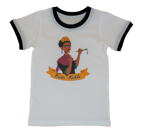 White ringer t-shirt with black ring collar and sleeve cuffs. Image of cartoon illustrated Frida Kahlo wearing aqua blue pendant earrings, dark rose-coloured scarf, black dress with blue checked cuffs and holding her paint brush with small drips of paint falling from the bristles. She is depicted with a small yellow rose bouquet headband on her dark brown hair. Below her image is a golden yellow ribbon bearing her name.