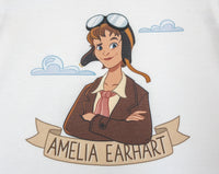 Close-up image of cartoon illustrated Amelia Earhart wearing her flight goggles on her forehead, rose-coloured scarf and brown leather bomber jacket. Two light blue clouds in the background. Below her image is a light brown ribbon bearing her name.