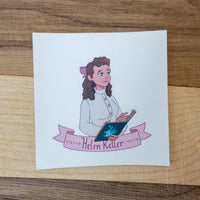 On white paper sticker, close-up image of cartoon illustrated Helen Keller wear a cream-coloured button-up blouse, with her curly hair tied back with a rose-coloured bow. She stares confidently while fingering through the pages of large book. Below her image is a ribbon with her name in conventional text and braille. Sticker measures 2 by 2 inches in area.