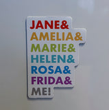 Picture of two by three inch white rectangular fridge magnet with the all caps names of Jane, Amelia, Marie, Helen, Rosa, Frida and Me stacked vertically. Each name is in a different colour of typeface - in descending order these colours are red, orange, green, turquoise, blue, purple and charcoal grey. This magnet sits against the metal surface of a dishwasher.